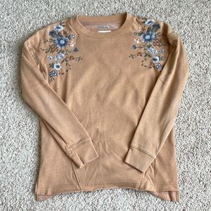 American Eagle extra extra small tan sweatshirt with embroidered flowers.